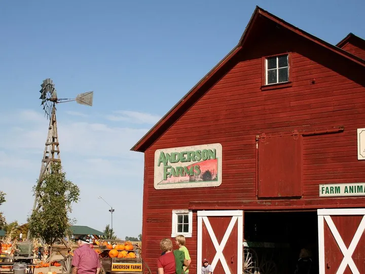 The red barn at Anderson Farms, where the corn maze and pumpkin patch run each autumn