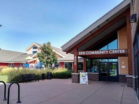 The west entrance of the Erie Community Center, with the playground beyond