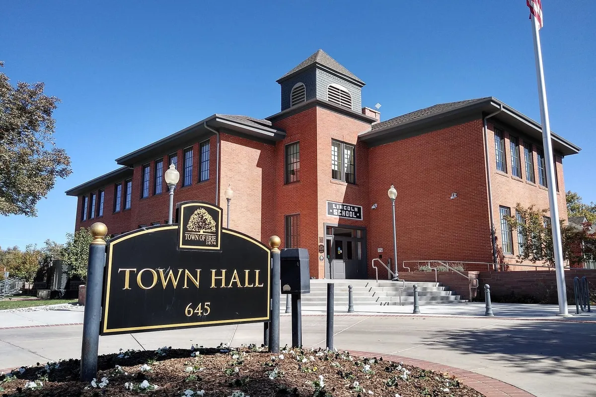 Erie Town Hall in the red-brick 1906 Lincoln School, with its bell tower
