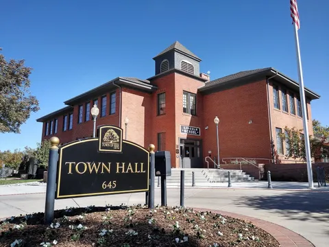 Erie Town Hall in the red-brick 1906 Lincoln School, with its bell tower
